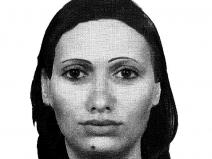 žena